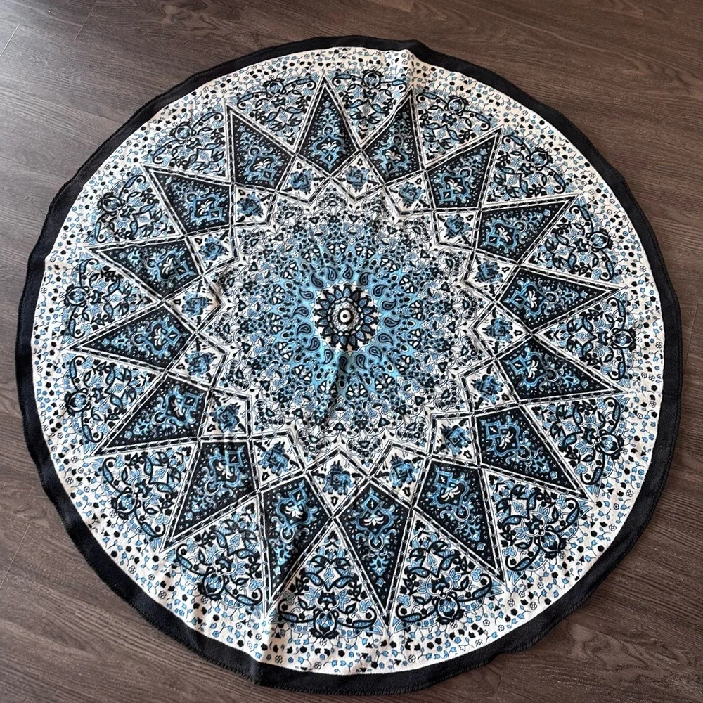 Round Blue Mandala Beach Towel in blue and black print